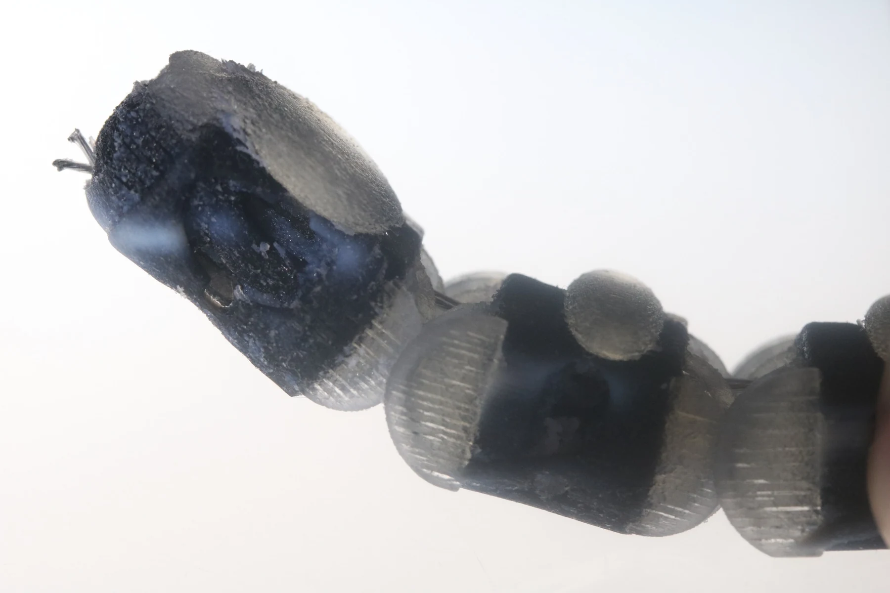 Close-up of an earlier printed finger and its surrounding flexible skin
