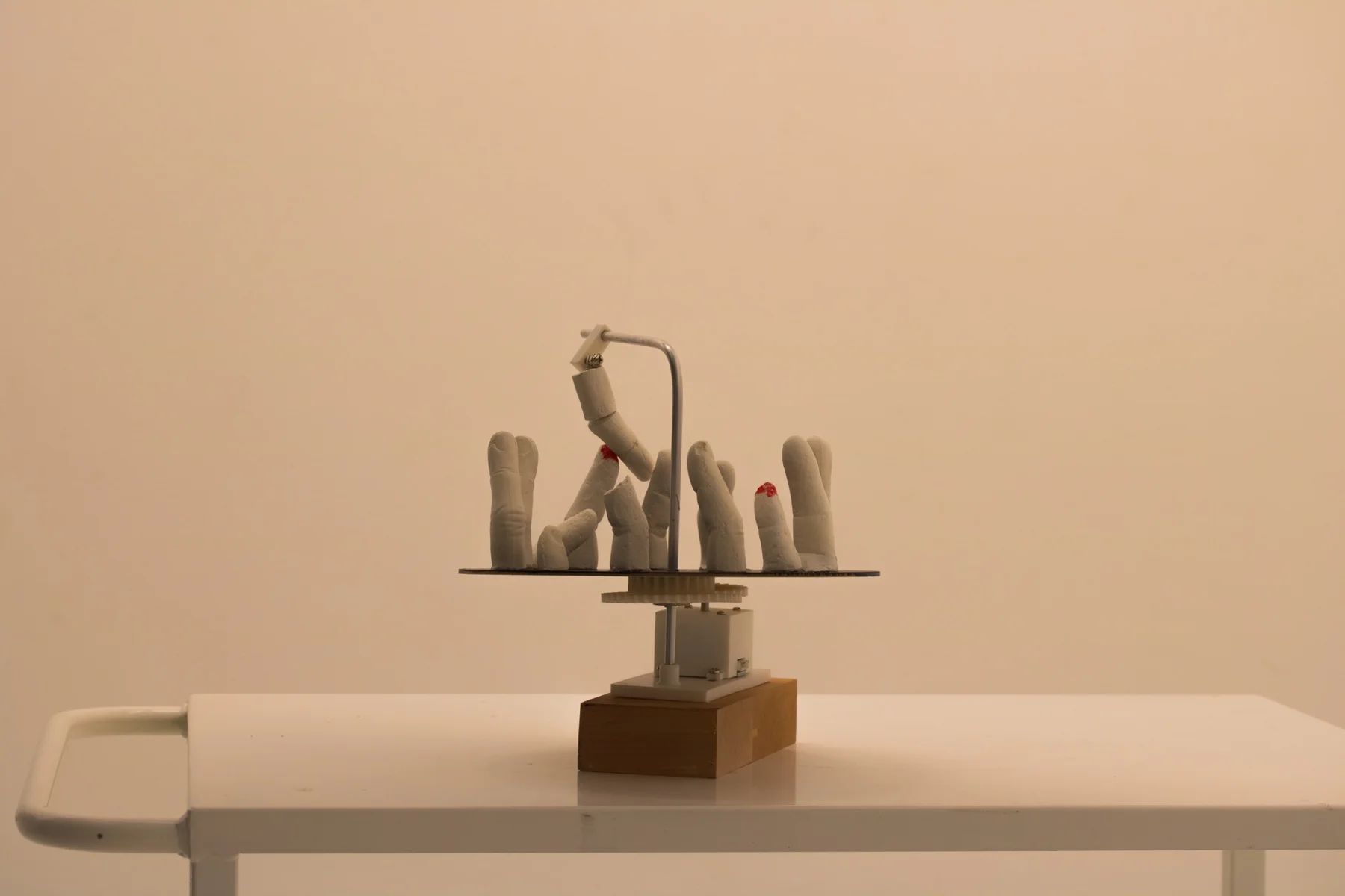 A circular arrangement of articulated fingers on a tabletop
